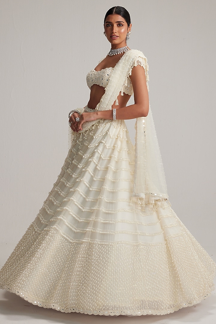 Off-White Organza Mirror & Pearl Embroidered Bridal Lehenga Set by Vvani By Vani Vats at Pernia's Pop Up Shop