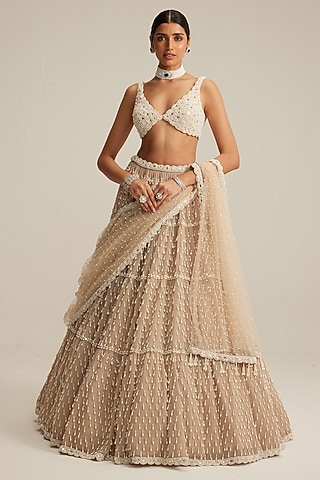 Light Beige Georgette Pearl Drop Embroidered Tiered Lehenga Set by Vvani by Vani Vats