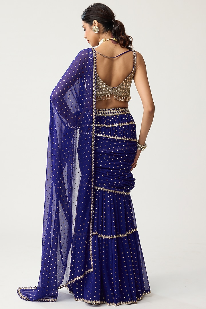 Persian Blue Georgette Mirror Hand Embroidered Tiered Wedding Saree Set by Vvani by Vani Vats at Pernia's Pop Up Shop