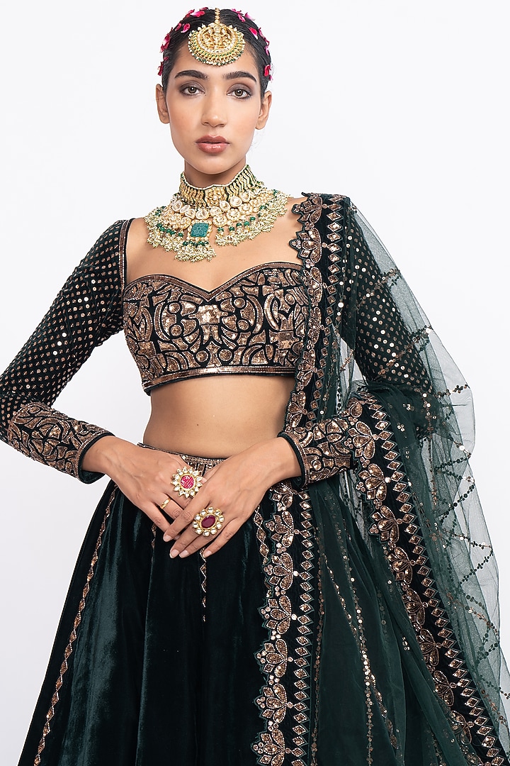 Dark Green Velvet Layered Wedding Lehenga Set by Vvani by Vani Vats at Pernia's Pop Up Shop