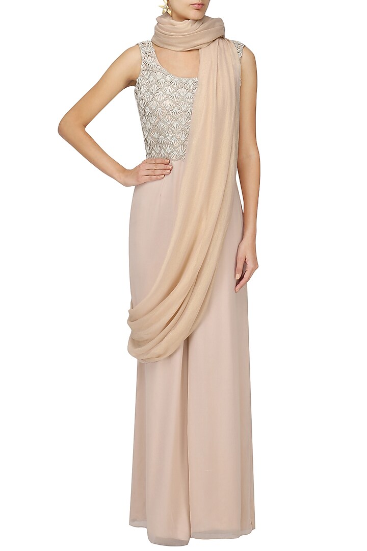 Nude cutwork embroidered saree with embellished blouse available only at Pernia's Pop Up Shop.