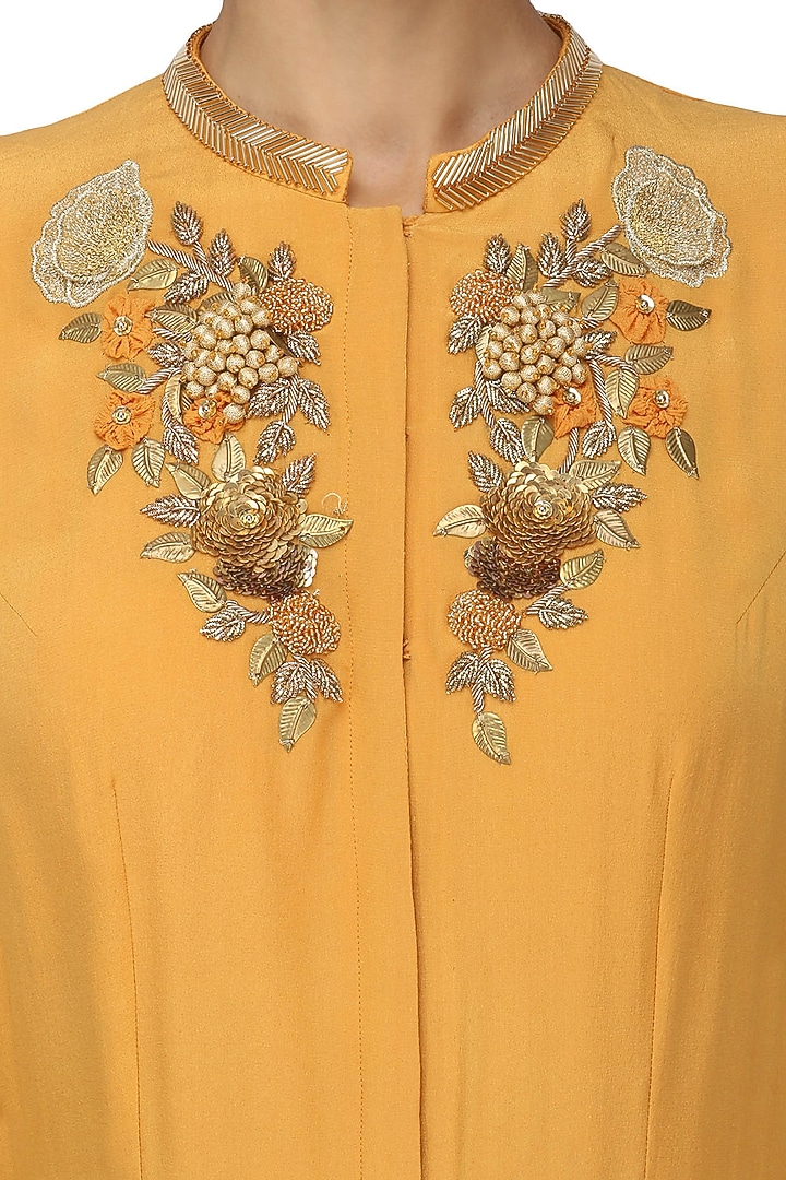 Tan embroidered jacket style gown available only at Pernia's Pop Up Shop.