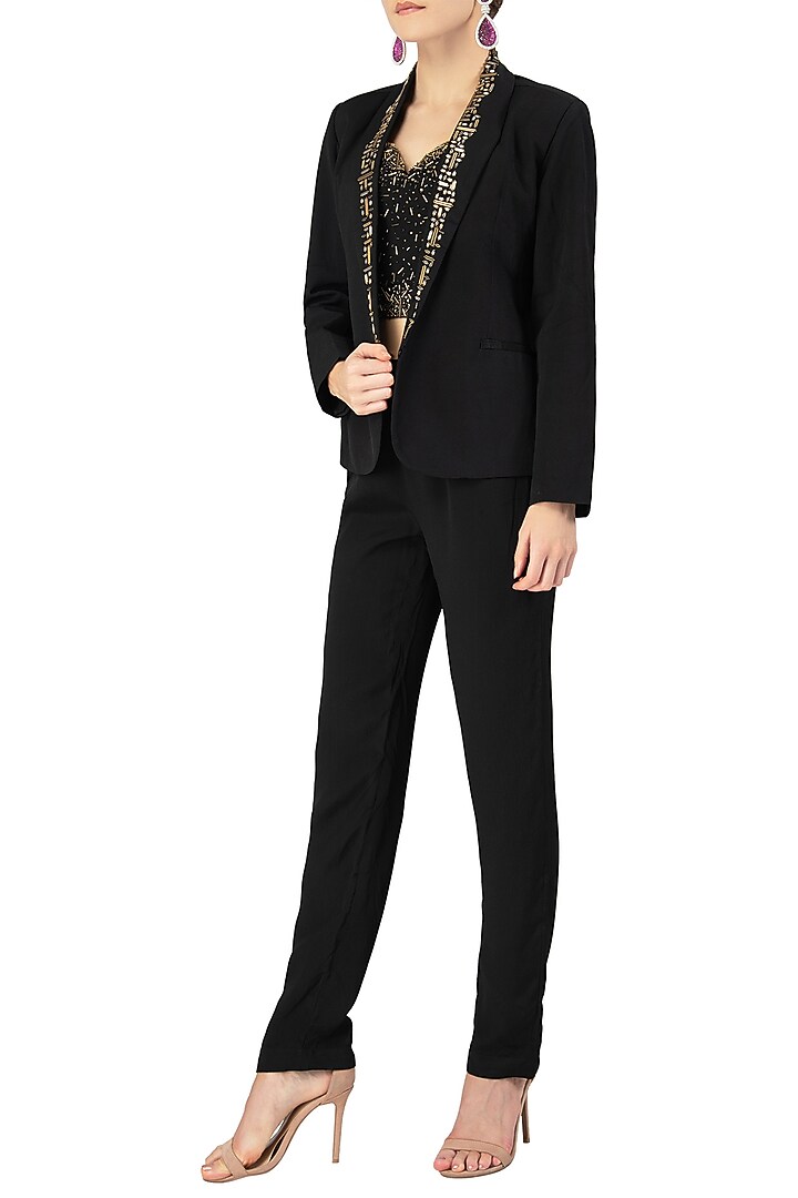 Black embellished bralette with jacket and pants available only at Pernia's Pop Up Shop.