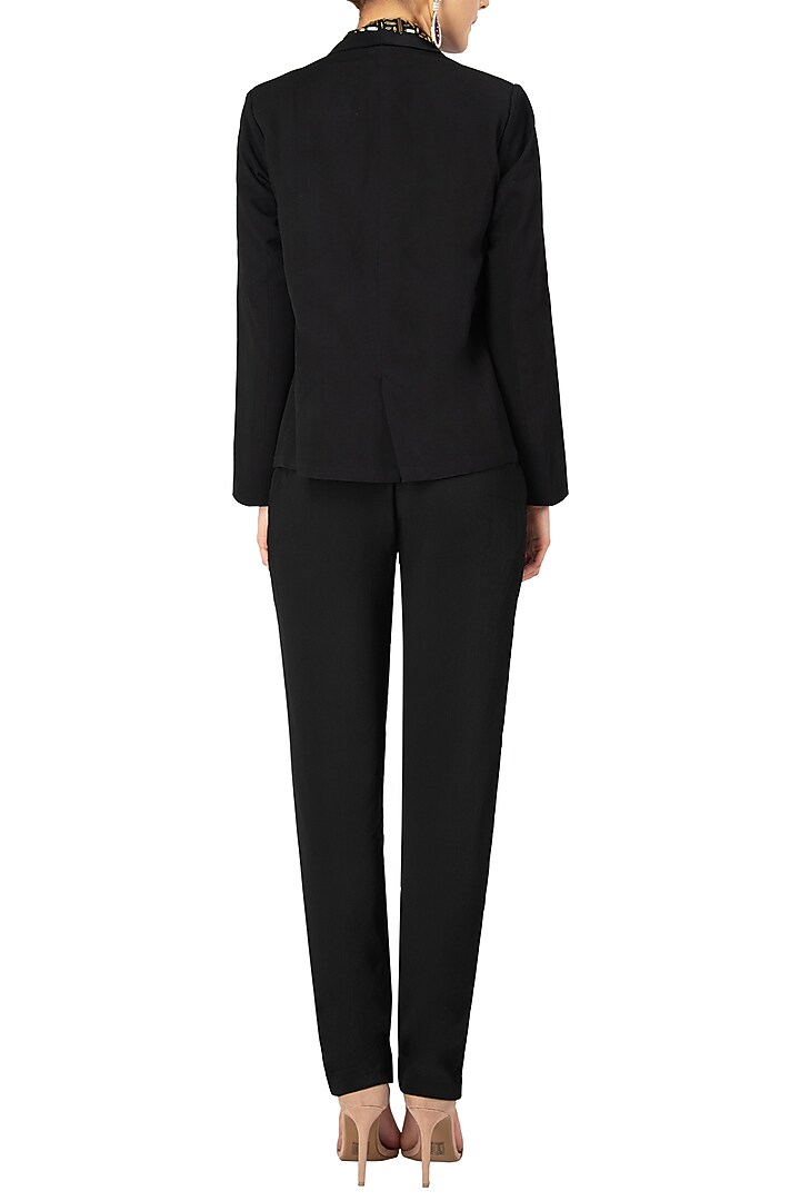 Black embellished bralette with jacket and pants available only at Pernia's Pop Up Shop.
