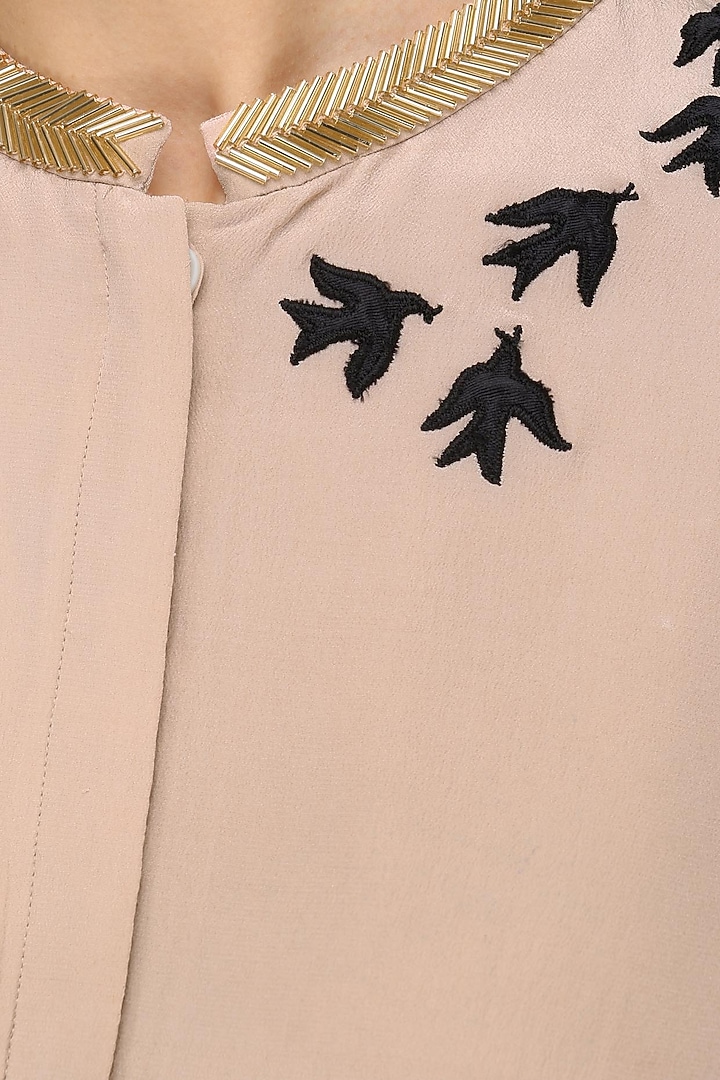 Nude birds and bugle peplum top available only at Pernia's Pop Up Shop.