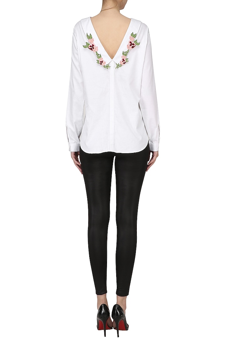 White flowers and leaf shirt available only at Pernia's Pop Up Shop.