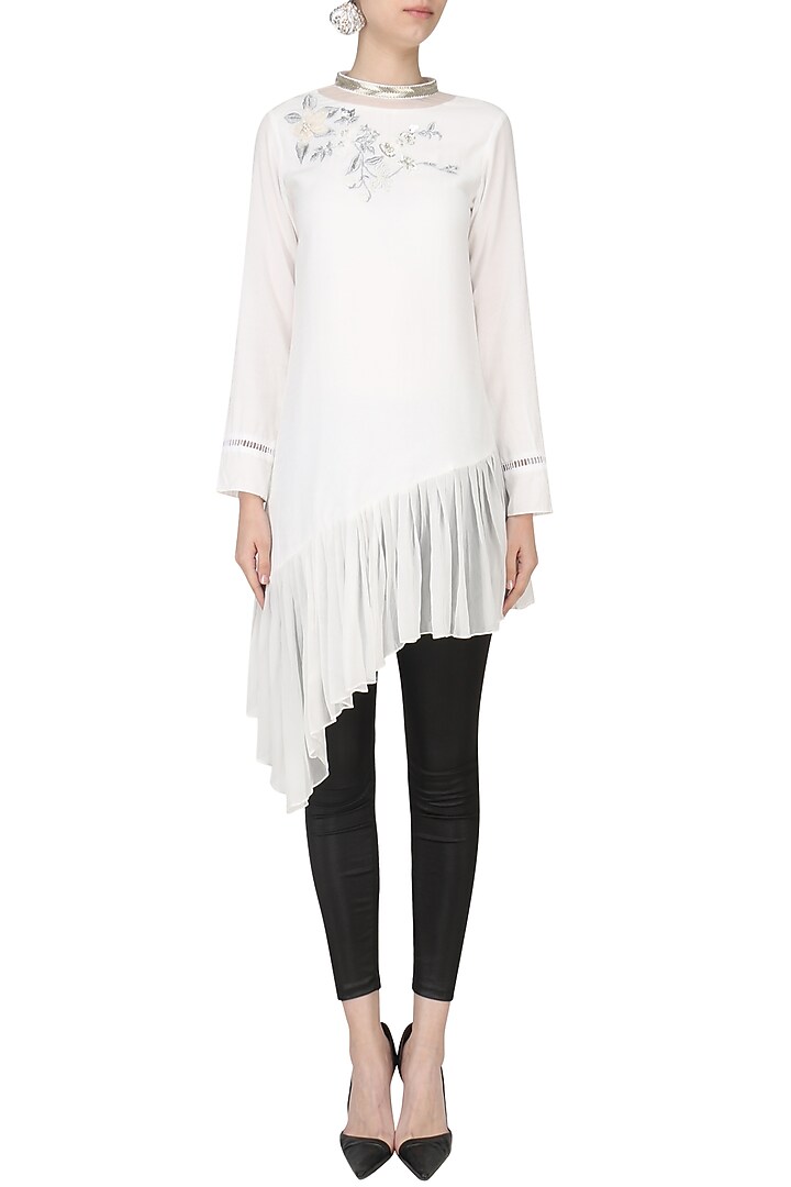 White asymmetric embroidered tunic available only at Pernia's Pop Up Shop.