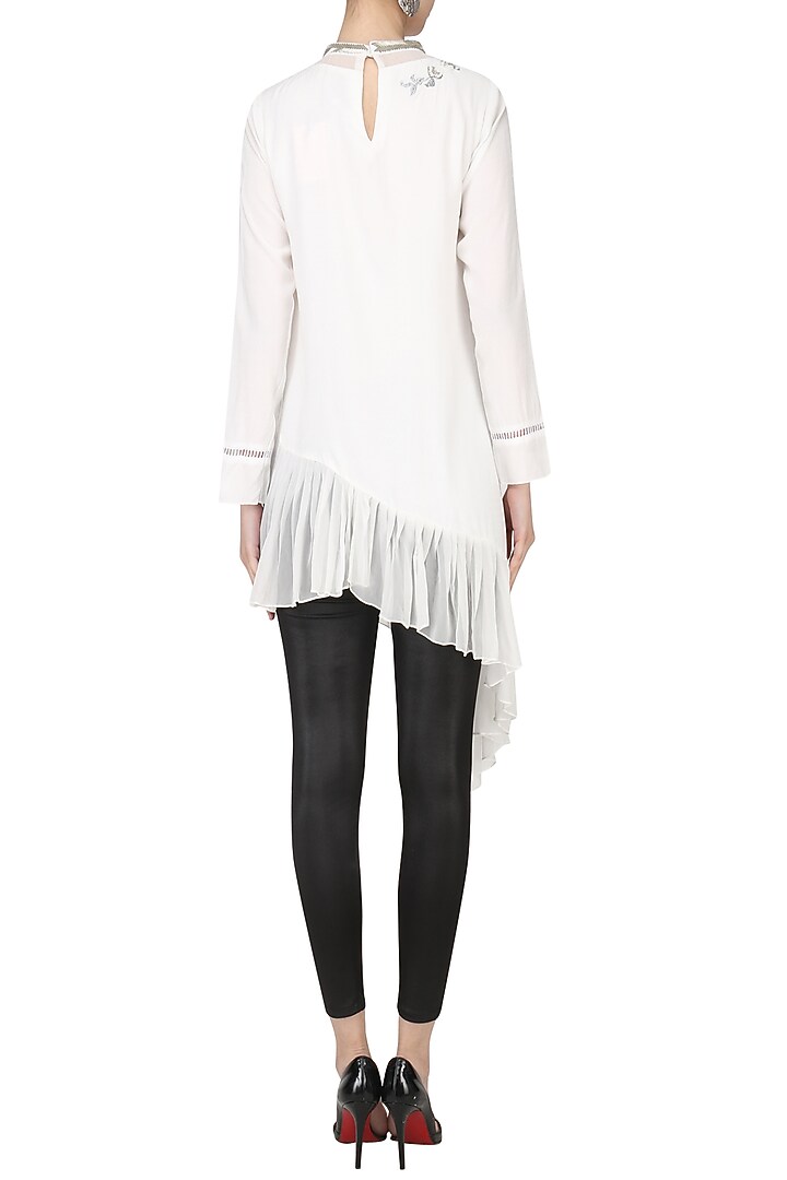 White asymmetric embroidered tunic available only at Pernia's Pop Up Shop.