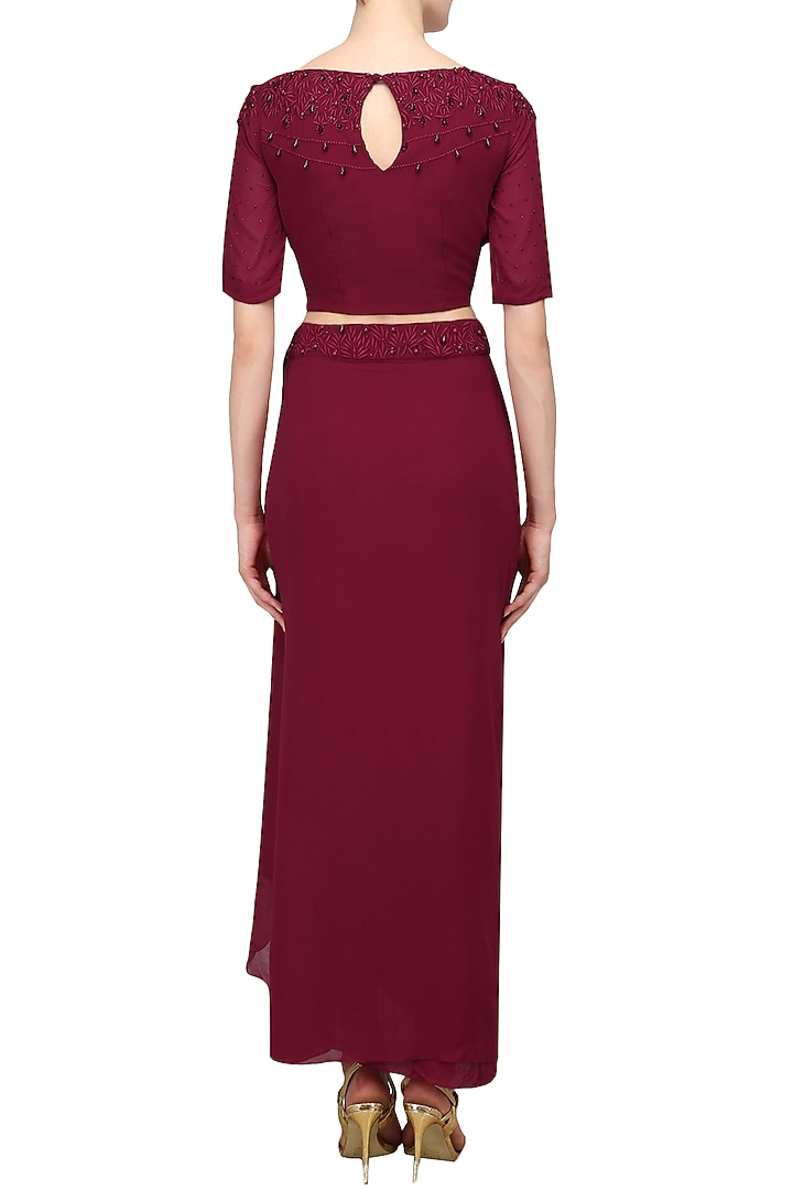 Maroon pearl embroidered crop top and drape skirt set available only at Pernia's Pop Up Shop.