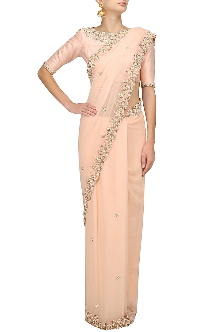 Salmon pink pearl embroidered saree and blouse set available only at Pernia's Pop Up Shop.