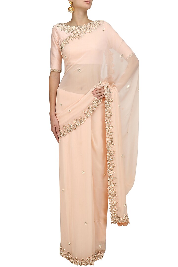 Salmon pink pearl embroidered saree and blouse set available only at Pernia's Pop Up Shop.