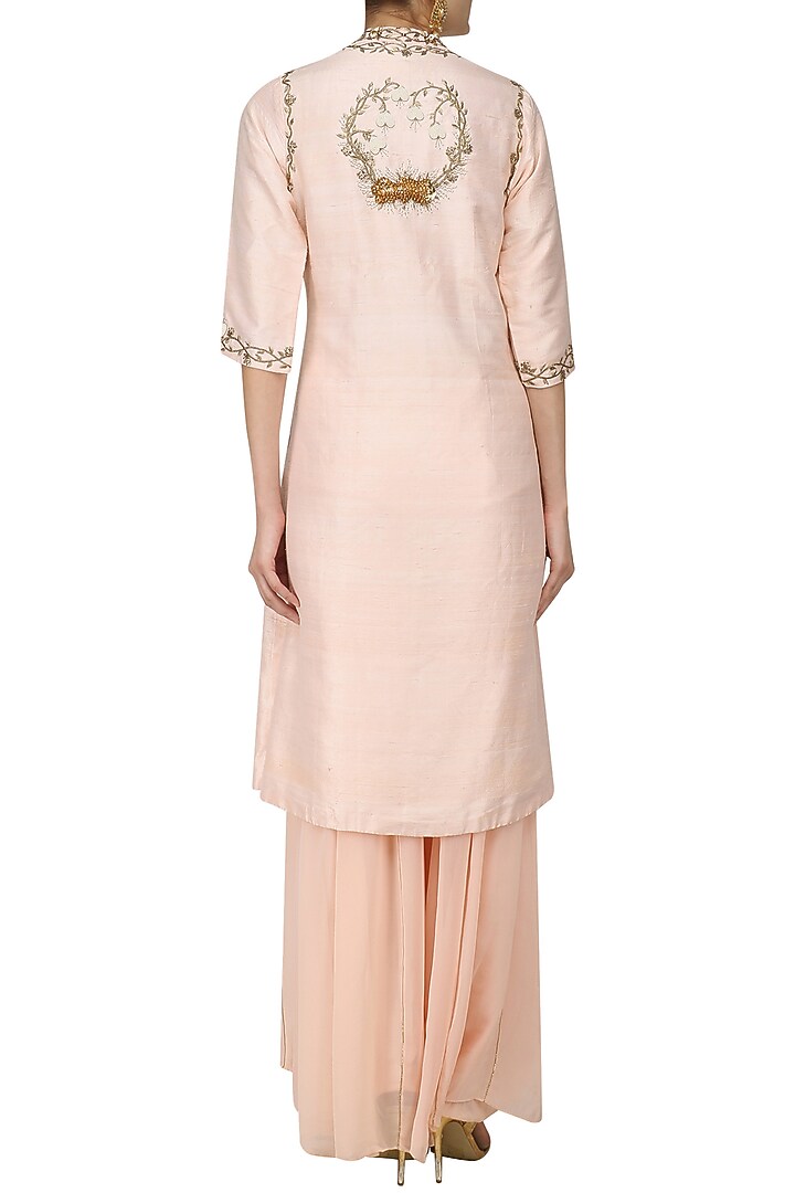 Salmon pink embroidered jacket and sharara pants set available only at Pernia's Pop Up Shop.