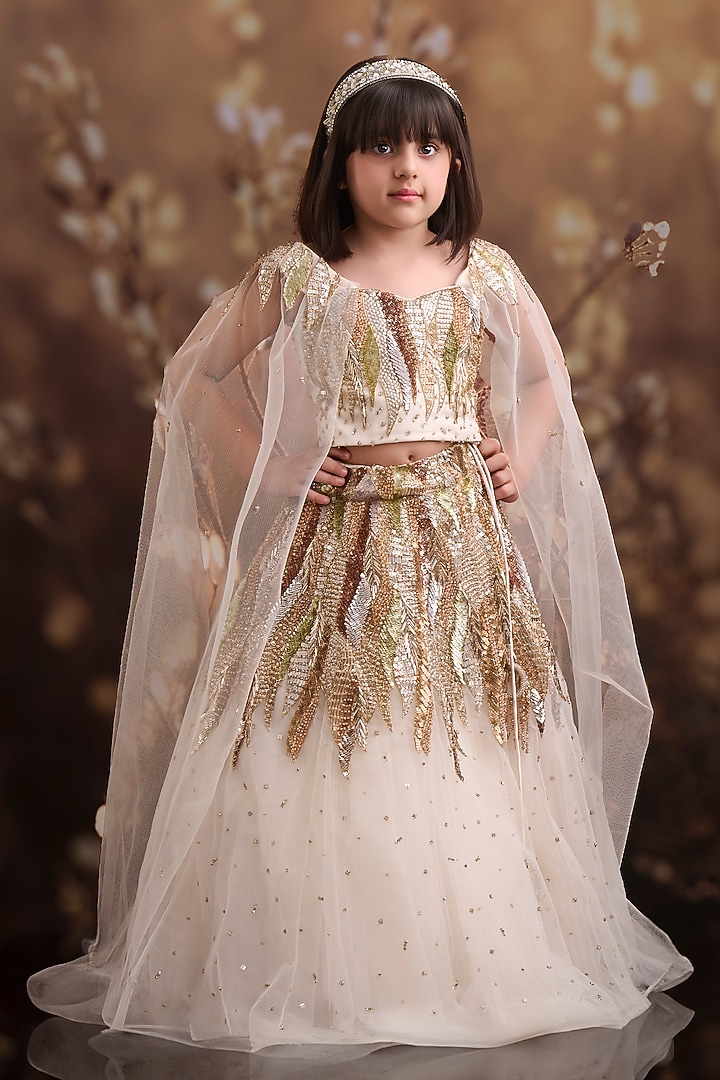 Champagne Net Embroidered Lehenga Set For Girls by Pooja Wang at Pernia's Pop Up Shop