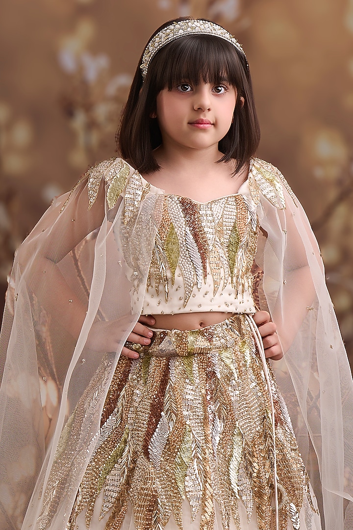 Champagne Net Embroidered Lehenga Set For Girls by Pooja Wang at Pernia's Pop Up Shop