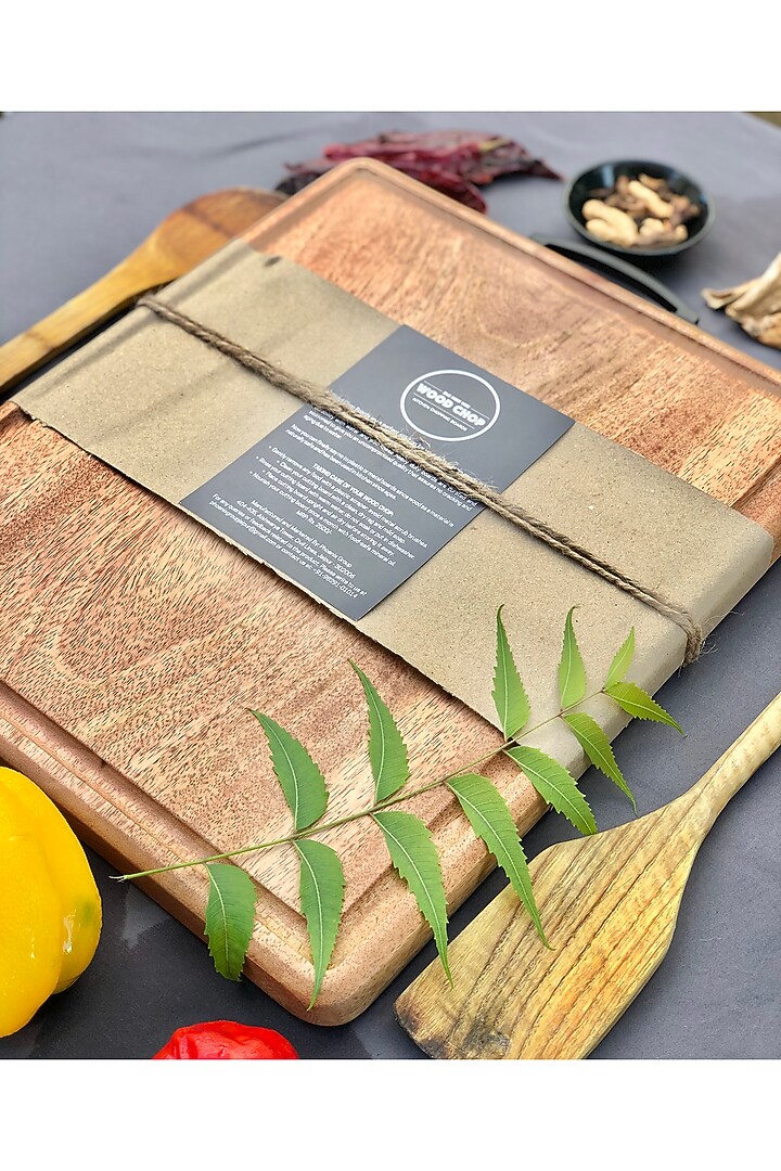 Brown Mango Wood Cutting Board by Wood Chop at Pernia's Pop Up Shop