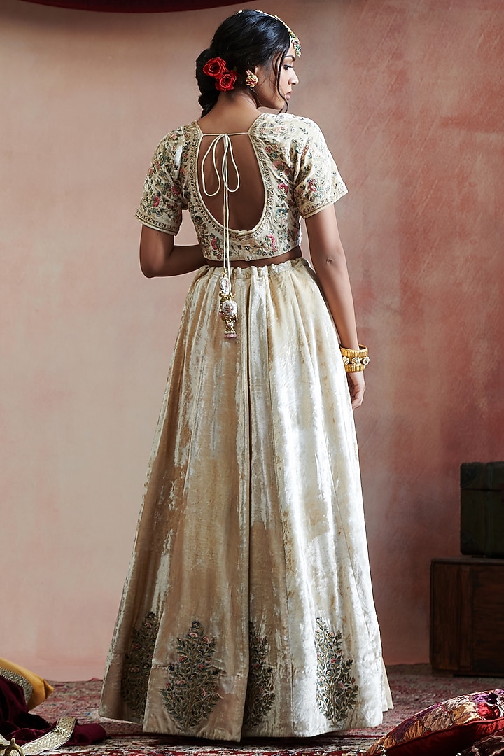 Beige Velvet Hand Embroidered Wedding Lehenga Set by Weaverstory at Pernia's Pop Up Shop