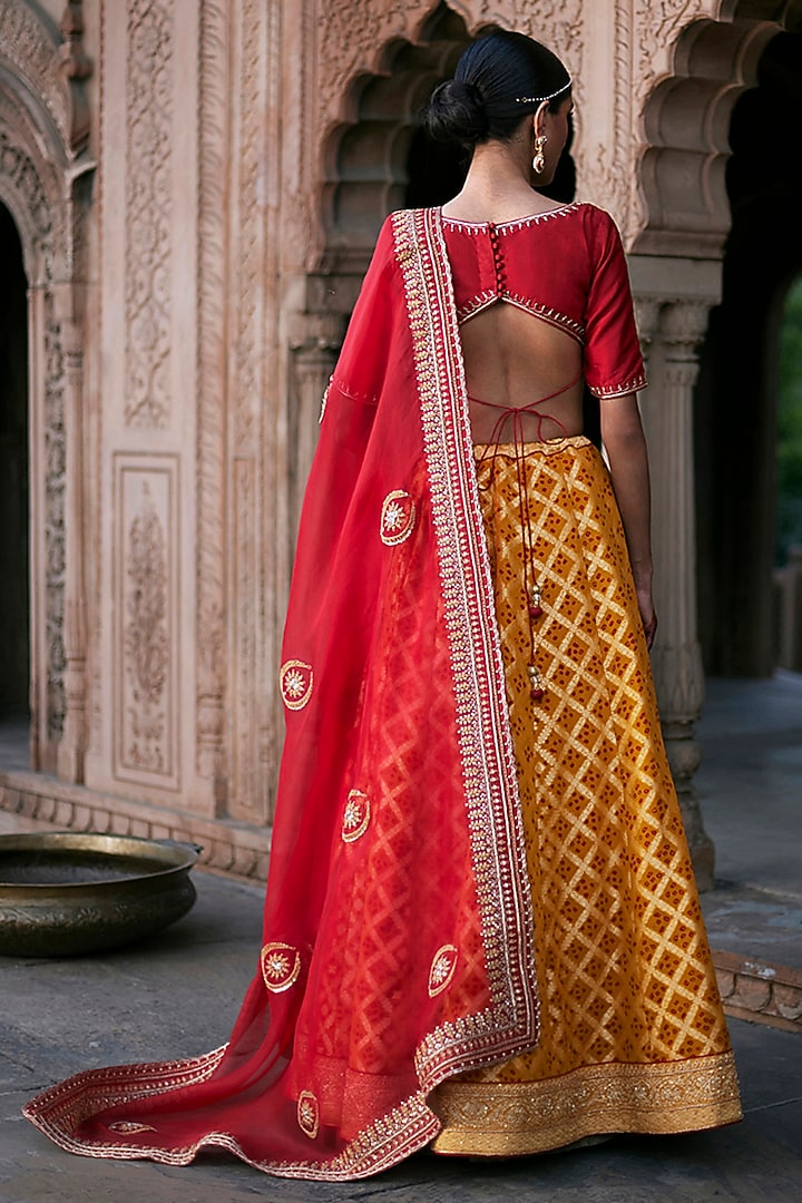 Yellow Georgette Banarasi Bandhej Kalidar Wedding Lehenga Set by Weaverstory at Pernia's Pop Up Shop