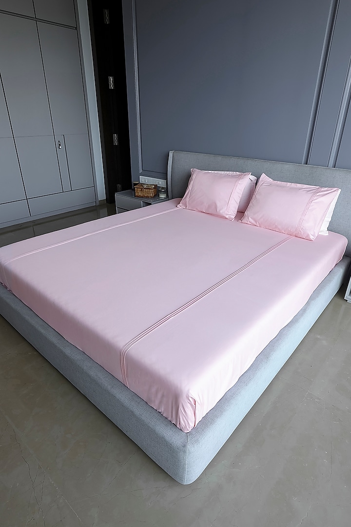 Salmon Pink Cotton Satin Bedsheet Set With Pleating Stitch Detail by Wendell Homes