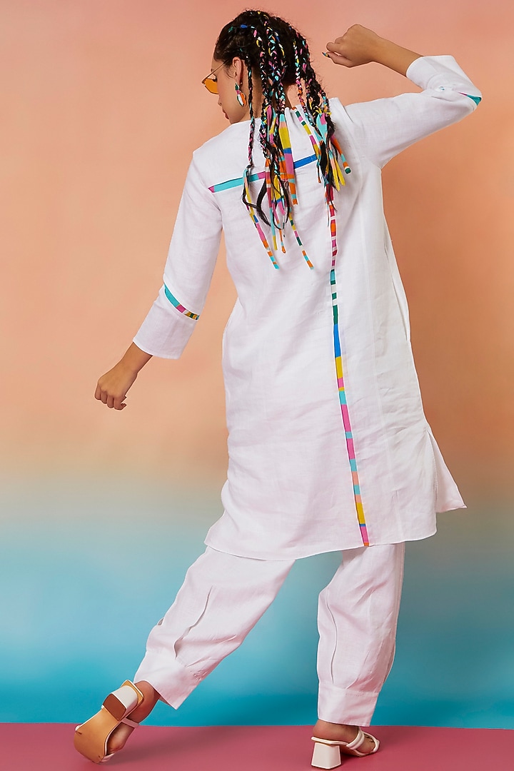 White Linen Bottom Pleated Jogger Pants by Wendell Rodricks at Pernia's Pop Up Shop