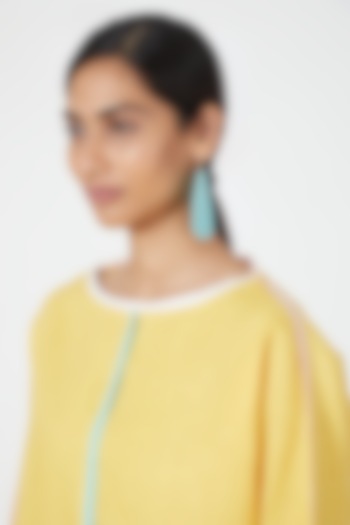Yellow Linen Top With Contrast Piping by Wendell Rodricks