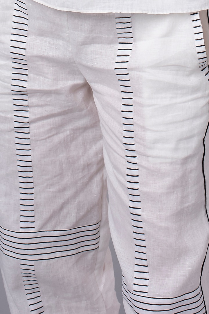 White Monochrome Striped Jogger Pants by Wendell Rodricks at Pernia's Pop Up Shop