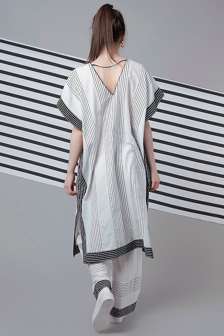 White Striped Patchwork Pants by Wendell Rodricks at Pernia's Pop Up Shop