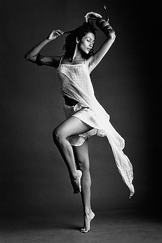 Off-White Satin Asymmetrical Strappy Top With Shorts by Wendell Rodricks