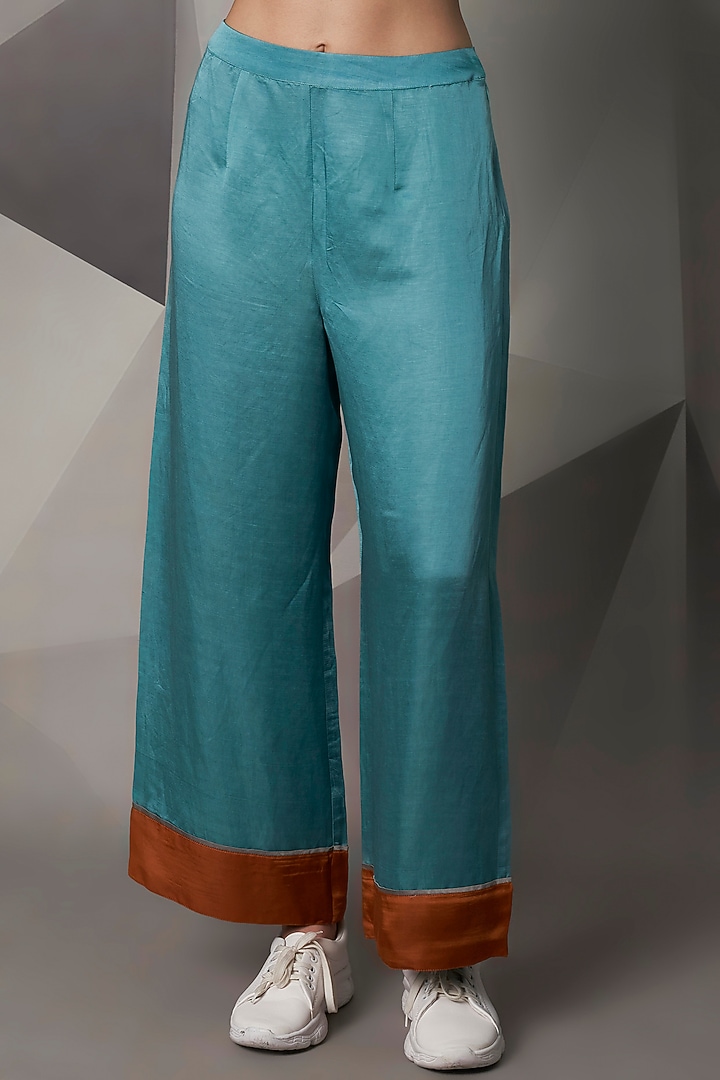 Turquoise Pants With Rust Patch Work by Wendell Rodricks at Pernia's Pop Up Shop