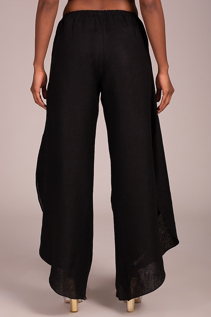 Black Curved Hem Pants by Wendell Rodricks at Pernia's Pop Up Shop