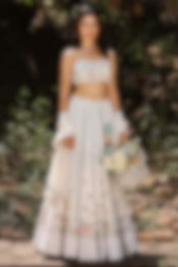 Cream Raw Silk Floral Motifs Embroidered Wedding Lehenga Set by The House of Ta-Ya at Pernia's Pop Up Shop