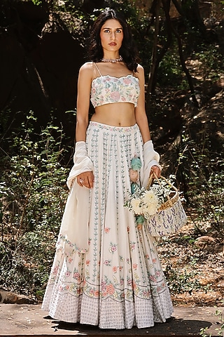 Cream Raw Silk Floral Motifs Embroidered Lehenga Set by The House of Ta-Ya