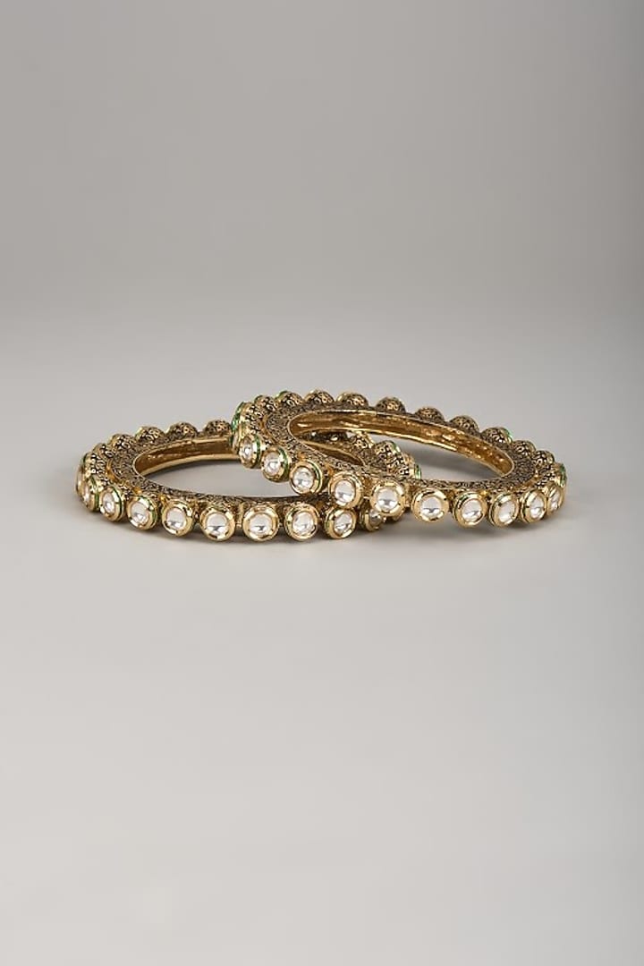 Gold Finish Kundan Polki Bangles (Set Of 2) by VASTRAA Jewellery at Pernia's Pop Up Shop