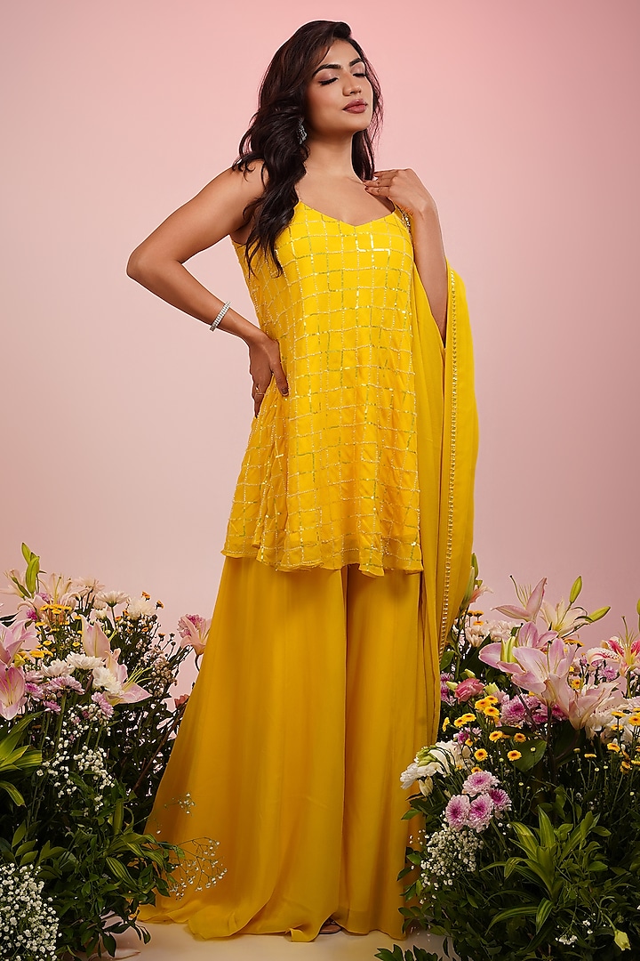 Yellow Georgette Sharara Set by Krishna Padia