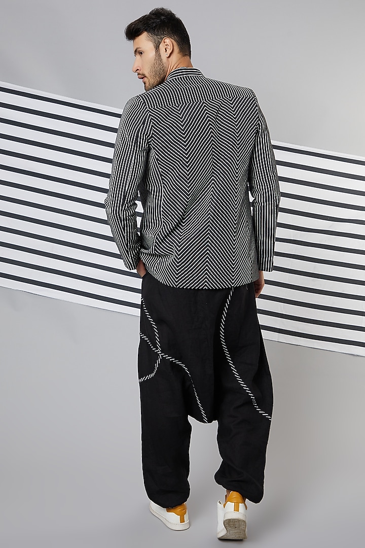 Black Linen Striped Tape Dhoti Pants by Wendell Rodricks Men at Pernia's Pop Up Shop