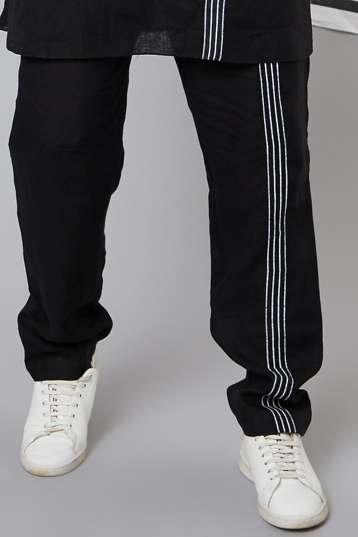 Black Striped Tape Pants by Wendell Rodricks Men at Pernia's Pop Up Shop