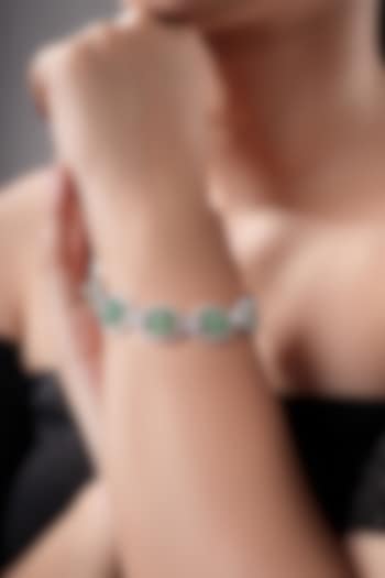 White Rhodium Finish American Diamond & Green Synthetic Stone Bracelet by XAGO at Pernia's Pop Up Shop