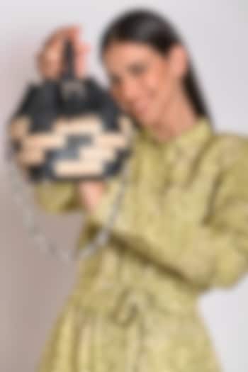 Black Upcycled Full Grain Leather Bucket Handbag by X FEET ABOVE at Pernia's Pop Up Shop