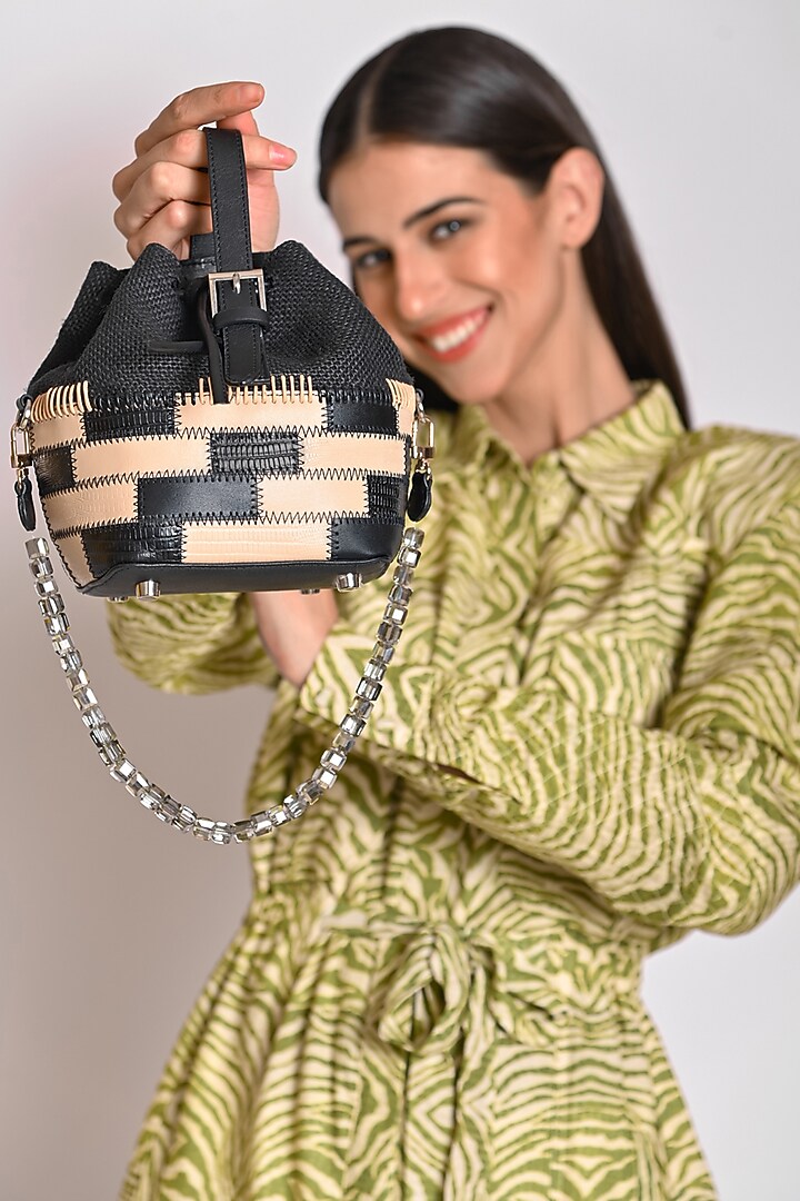 Black Upcycled Full Grain Leather Bucket Handbag by X FEET ABOVE at Pernia's Pop Up Shop