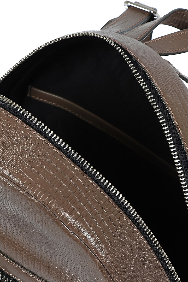 Taupe Upcycled Leather Backpack by X FEET ABOVE at Pernia's Pop Up Shop