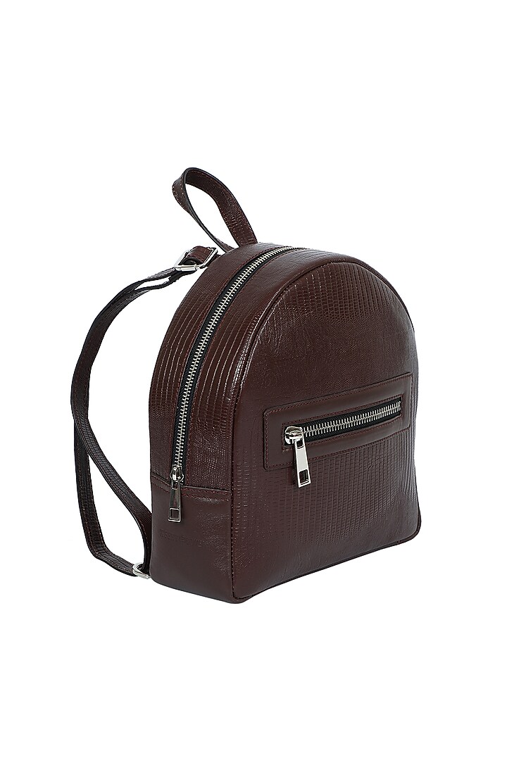 Brown Upcycled Leather Backpack by X FEET ABOVE at Pernia's Pop Up Shop