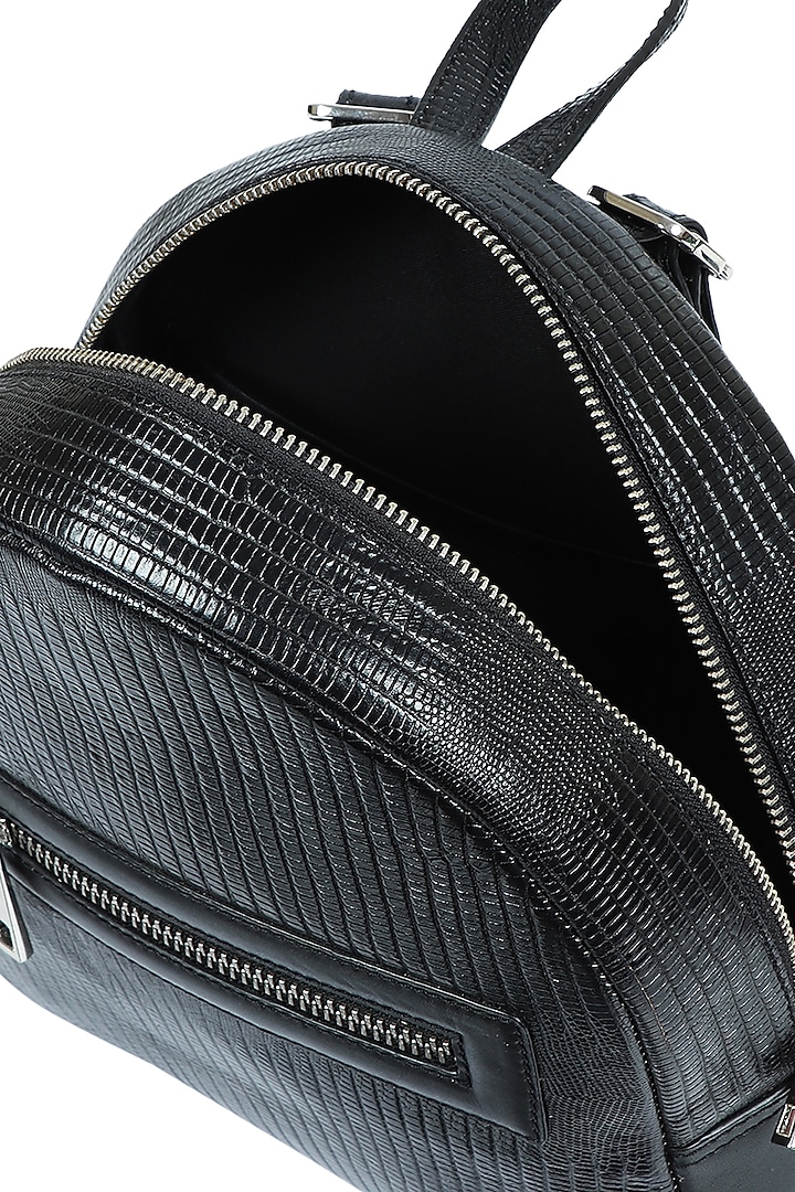 Black Upcycled Leather Backpack by X FEET ABOVE at Pernia's Pop Up Shop