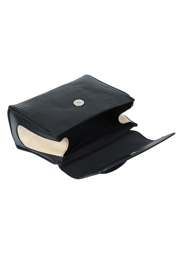 Black Full Grain Leather Crossbody Bag by X FEET ABOVE at Pernia's Pop Up Shop