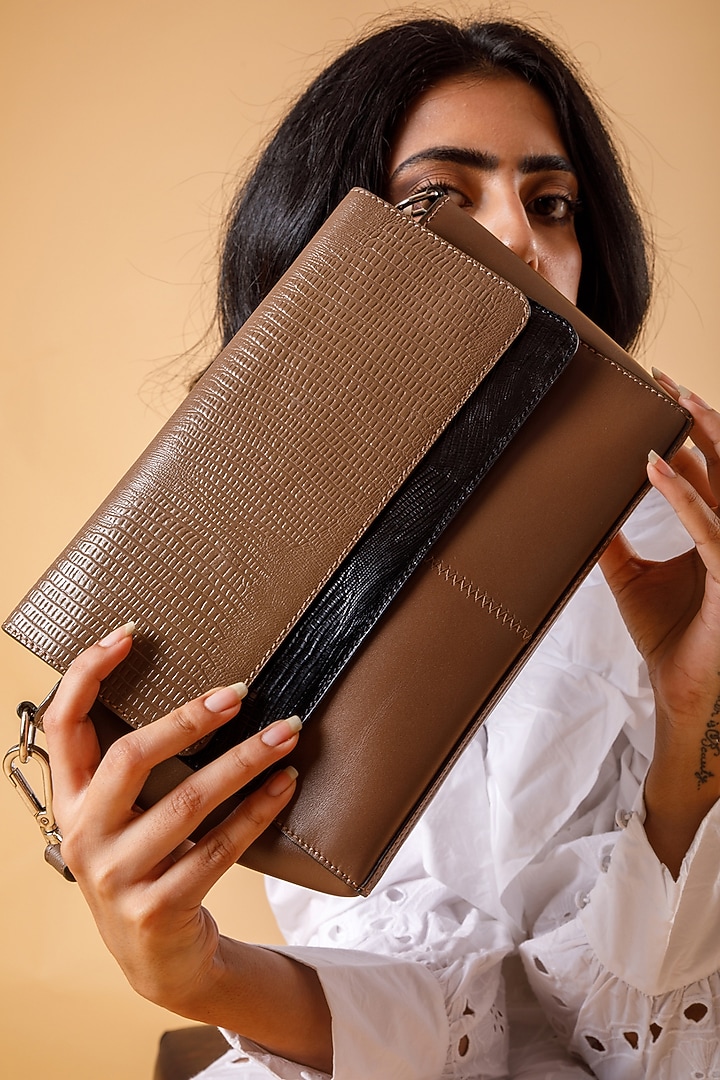 Taupe Upcycled Leather Hand Bag by X FEET ABOVE at Pernia's Pop Up Shop