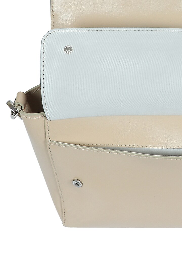 White Upcycled Leather Hand Bag by X FEET ABOVE at Pernia's Pop Up Shop