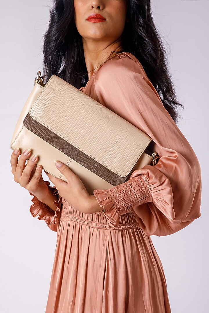 White Upcycled Leather Hand Bag by X FEET ABOVE at Pernia's Pop Up Shop