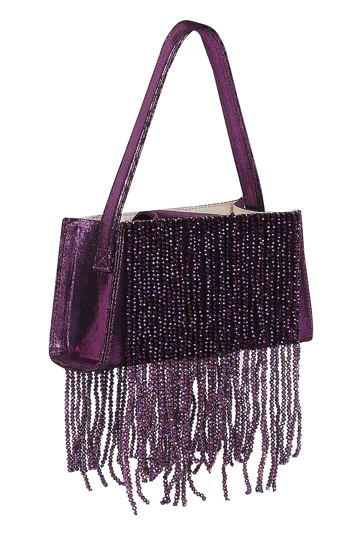 Violet Foiled Fabric Tasseled Hand Bag by X FEET ABOVE at Pernia's Pop Up Shop
