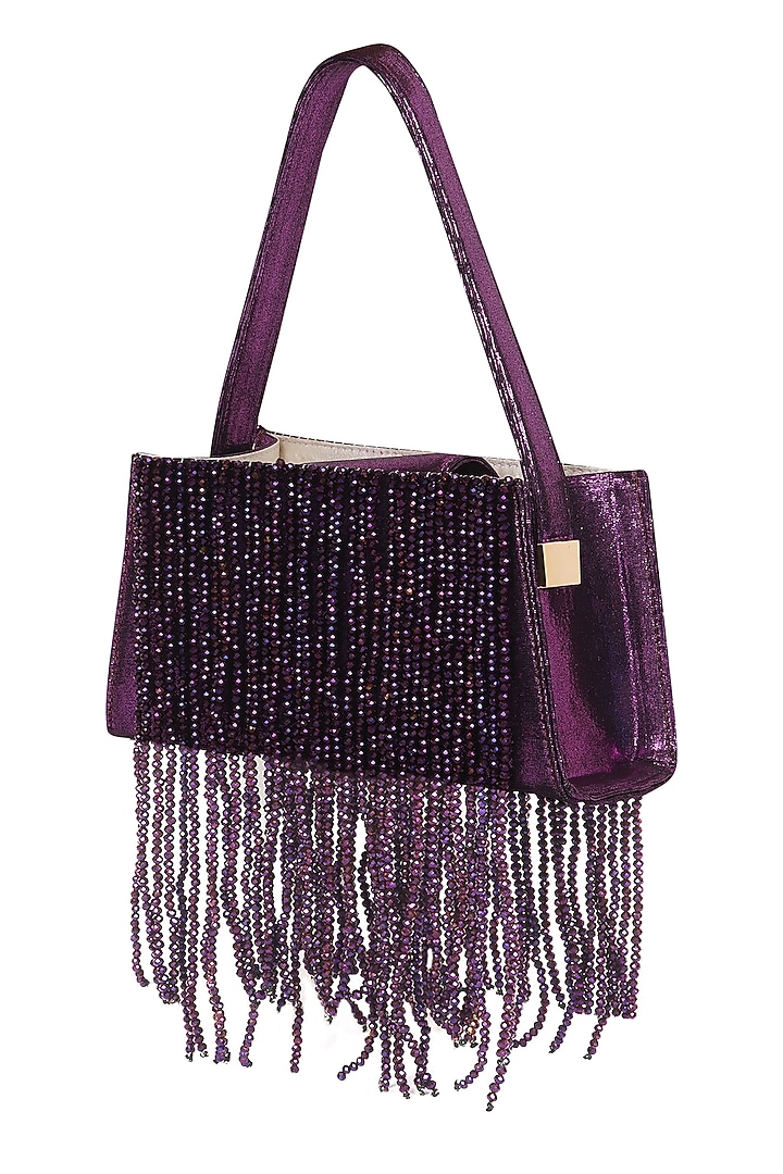 Violet Foiled Fabric Tasseled Hand Bag by X FEET ABOVE at Pernia's Pop Up Shop
