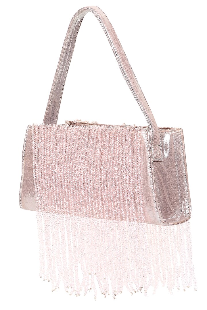 Pink Foiled Fabric Tasseled Hand Bag by X FEET ABOVE at Pernia's Pop Up Shop