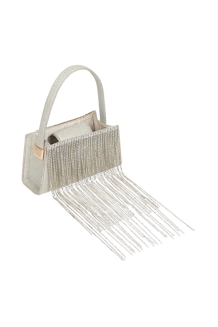 Silver Foiled Fabric Tasseled Hand Bag by X FEET ABOVE at Pernia's Pop Up Shop