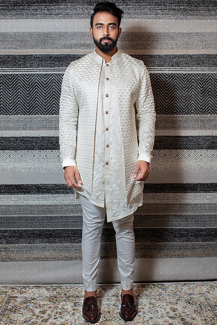Off White Asymmetrical Kurta Set With Embroidered Open Jacket by YAJY By Aditya Jain